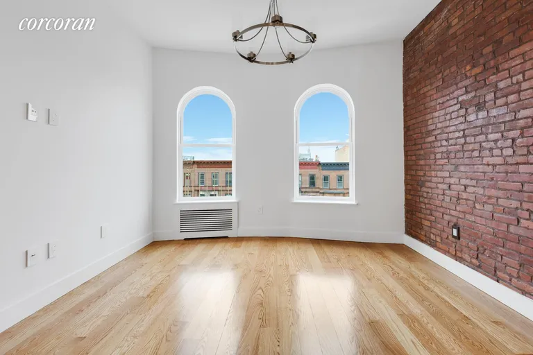 New York City Real Estate | View 211 8th Avenue, 3C | Sun Splashed Living Room | View 2