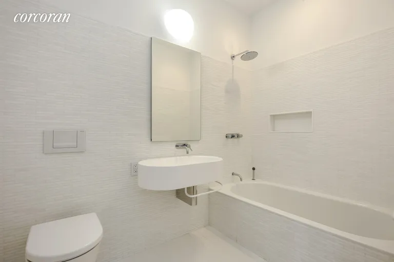 New York City Real Estate | View 56 Leonard Street, 34AEAST | Renovated Bath with Tub | View 8
