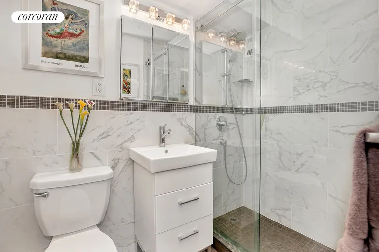 New York City Real Estate | View 142 East 16th Street, 11G | Totally renovated marble bathroom | View 3
