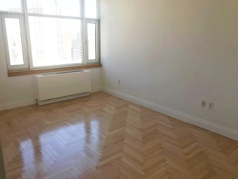 New York City Real Estate | View 404 East 76th Street, 22B | King Size Bedroom | View 3