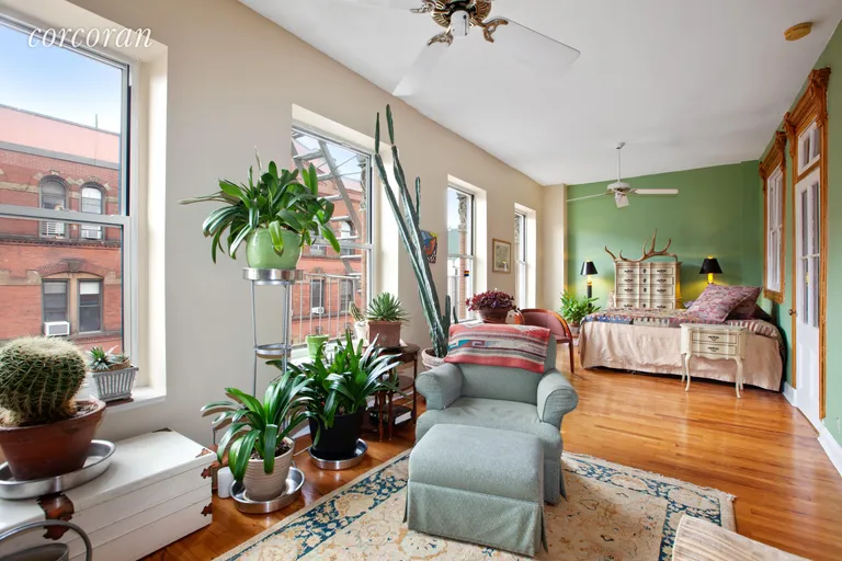 New York City Real Estate | View 223-225 East 4th Street, 19-20 | South Facing Living Room with four (4) Windows. | View 2
