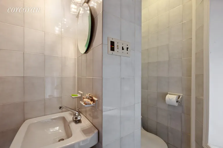 New York City Real Estate | View 223-225 East 4th Street, 19-20 | Window Bathroom | View 10