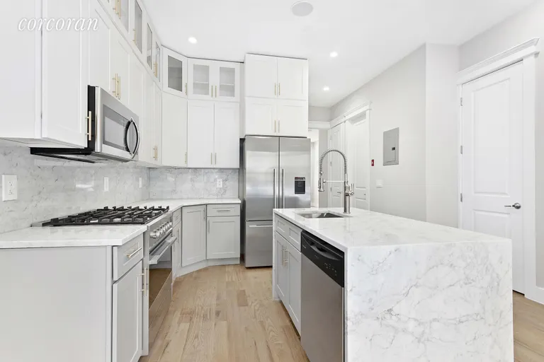 New York City Real Estate | View 19 Apollo Street | Chef's kitchen with massive waterfall countertops! | View 9