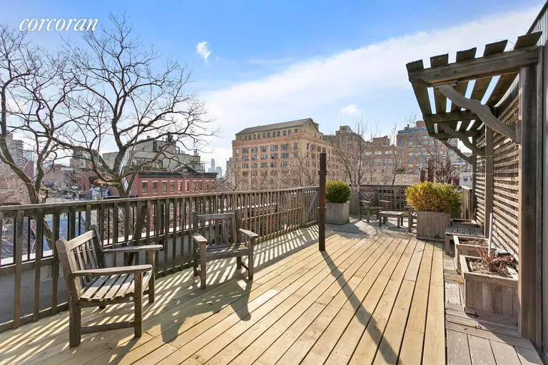 New York City Real Estate | View 344 West 12th Street, 4B | Landscaped roof deck with plants and lounge chairs | View 7