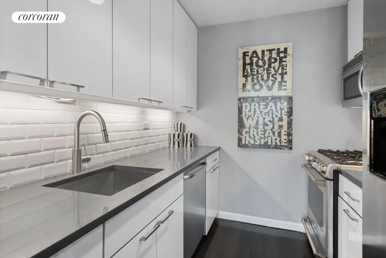 New York City Real Estate | View 100 United Nations Plaza, 40C | Beautifully renovated kitchenwith lacquer cabinets | View 3