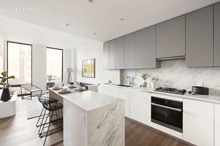 New York City Real Estate | View 287 East Houston Street, 4B | Open kitchen with fabulous dining bar | View 2