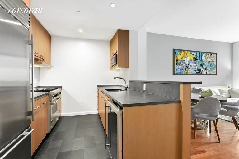 New York City Real Estate | View 255 Hudson Street, 4B | Large open Kitchen with wine fridge | View 3