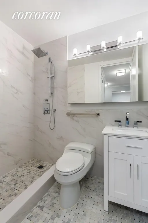 New York City Real Estate | View 235 East 40th Street, 3F | Brand New Marble Bathroom | View 6