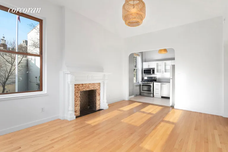 New York City Real Estate | View 101 West 11th Street, 2F | Sun-filled living/dining/entertainment space  | View 4