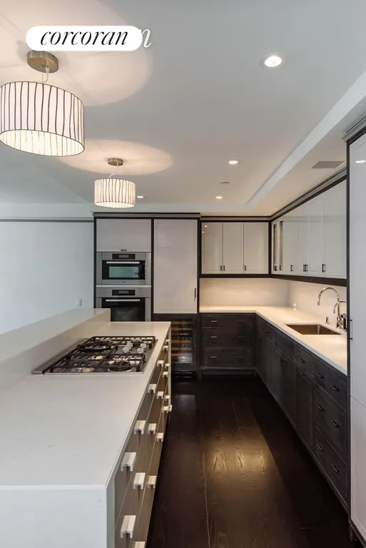 New York City Real Estate | View 21 East 61st Street, 10A | Designer Kitchen | View 3