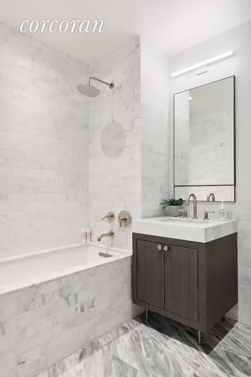 New York City Real Estate | View 211 West 14th Street, PENTHOUSE | Ensuite Guest Bath | View 11