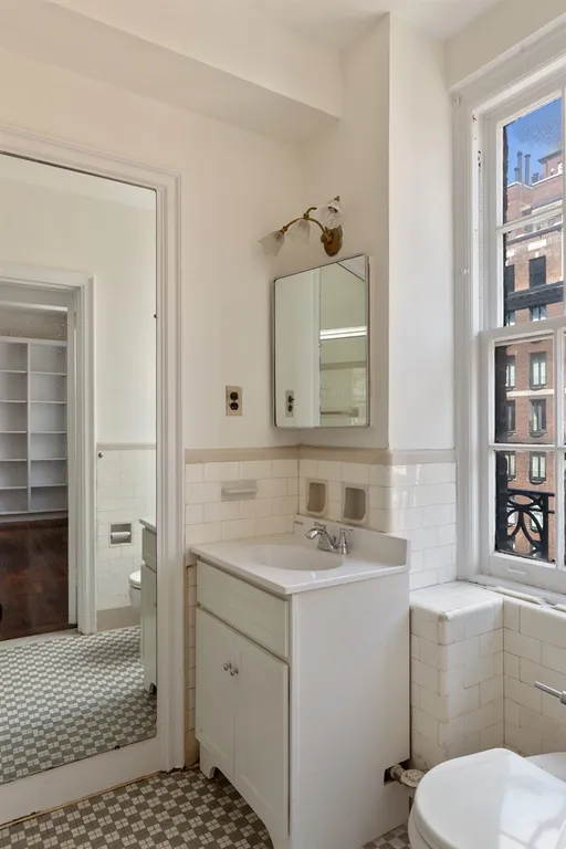 New York City Real Estate | View 444 East 57th Street, 12E | Windowed master bathroom | View 16