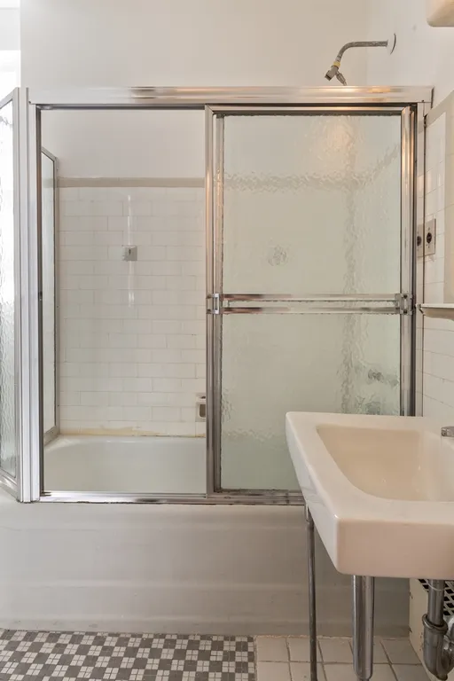 New York City Real Estate | View 444 East 57th Street, 12E | Full windowed bathroom | View 17