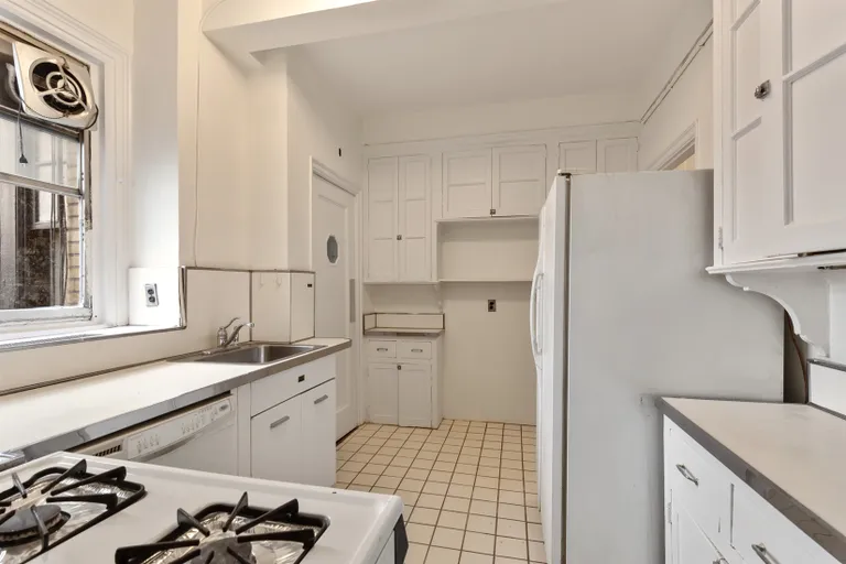 New York City Real Estate | View 444 East 57th Street, 12E | Windowed Kitchen | View 8