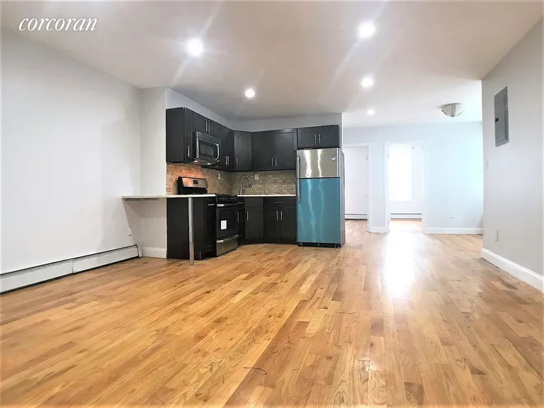 New York City Real Estate | View 5874 Maspeth Avenue, 1 | 4 Beds, 2 Baths | View 1