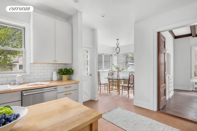 New York City Real Estate | View 197 Rugby Road | Cooking and dining with garden views | View 9