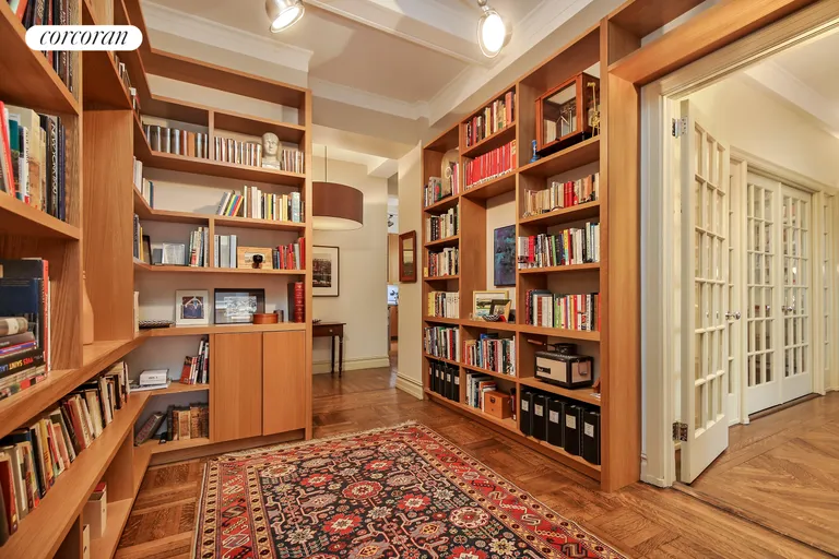 New York City Real Estate | View 302 West 86th Street, 10B | Library with custom bookcases | View 6