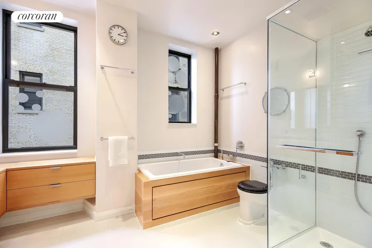 New York City Real Estate | View 302 West 86th Street, 10B | Spa-bathroom with two windows, bathtub & shower | View 9