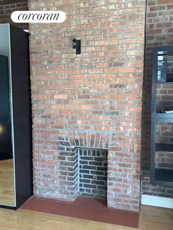 New York City Real Estate | View 119 Grand Street, 4R | Fireplace | View 6