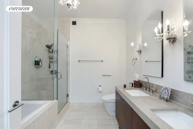 New York City Real Estate | View 30 West Street, PH2G | Marble Master Bathroom | View 4