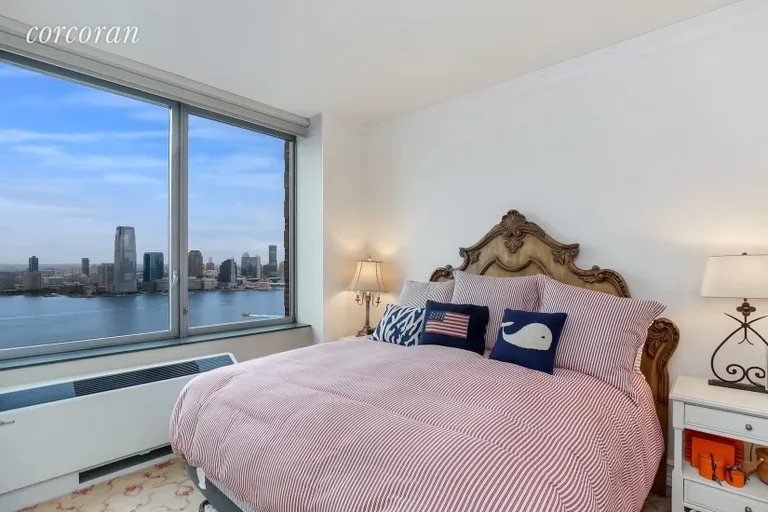 New York City Real Estate | View 30 West Street, PH2G | Master Bedroom with Direct River Views | View 3