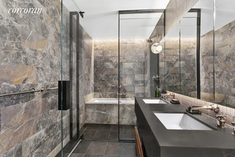 New York City Real Estate | View 155 West 18th Street, 503 | Elegant wet room with marble finishes   | View 6