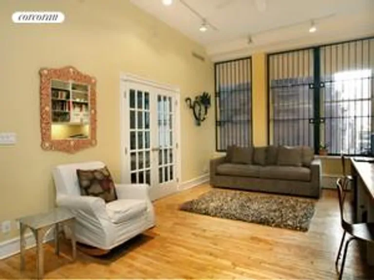 New York City Real Estate | View 652 Broadway, 3 | Family Room w built in Office  | View 6