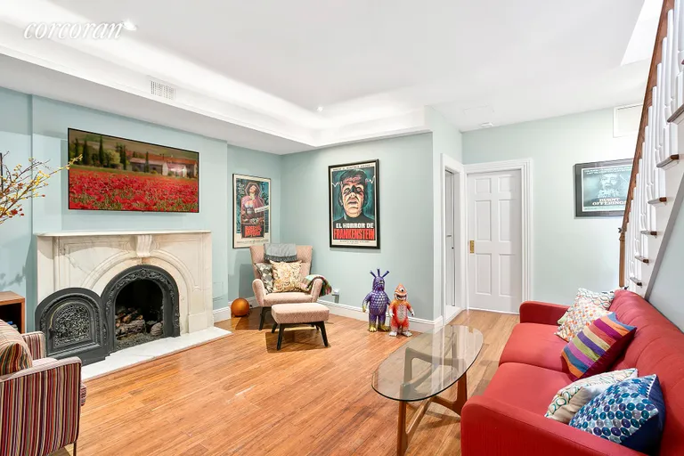 New York City Real Estate | View 371 Carlton Avenue | Living room upstairs with working fireplace | View 8