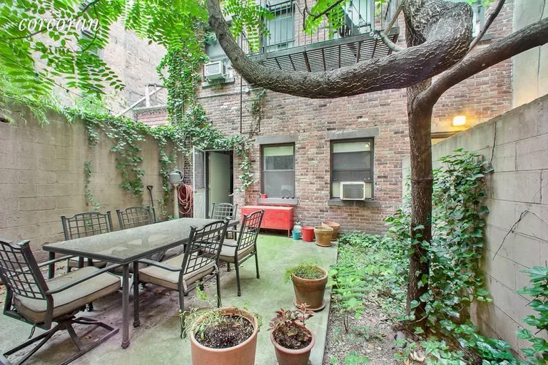 New York City Real Estate | View 52 Spring Street, garden | 1 Bed, 1 Bath | View 1