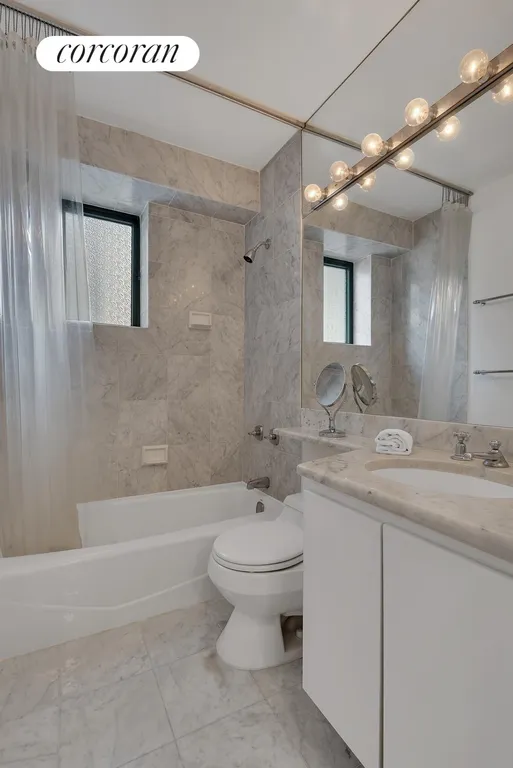 New York City Real Estate | View 45 East 25th Street, 28A | WINDOWED BATH IN WHITE CARRARA MARBLE! | View 7