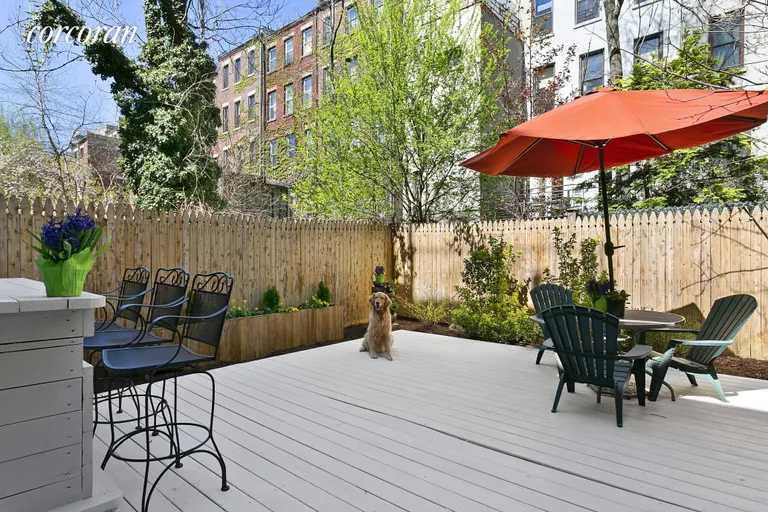 New York City Real Estate | View 107 West 120th Street, 1A | Gorgeous private backyard | View 2