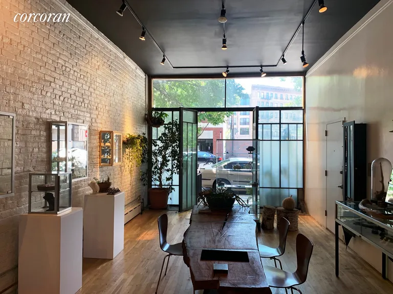 New York City Real Estate | View 457 Grand Street, 1 | Gallery Doors Open | View 3