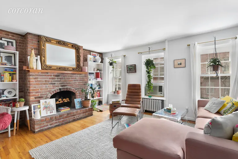 New York City Real Estate | View 251 West 21st Street, 2 | Wood burning fireplace with original prewar detail | View 2