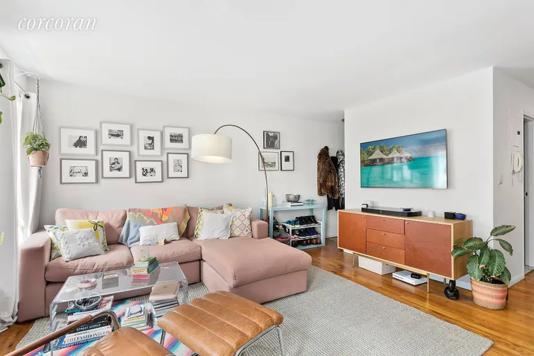 New York City Real Estate | View 251 West 21st Street, 2 | Gorgeous sun drenched Southern facing living room  | View 3