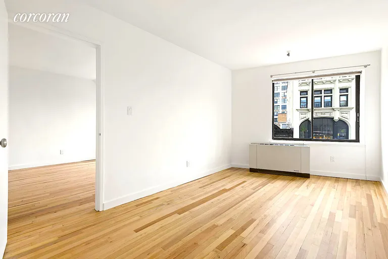New York City Real Estate | View 67 East 11th Street, 723 | Sunny Bedroom w enormous closets | View 2