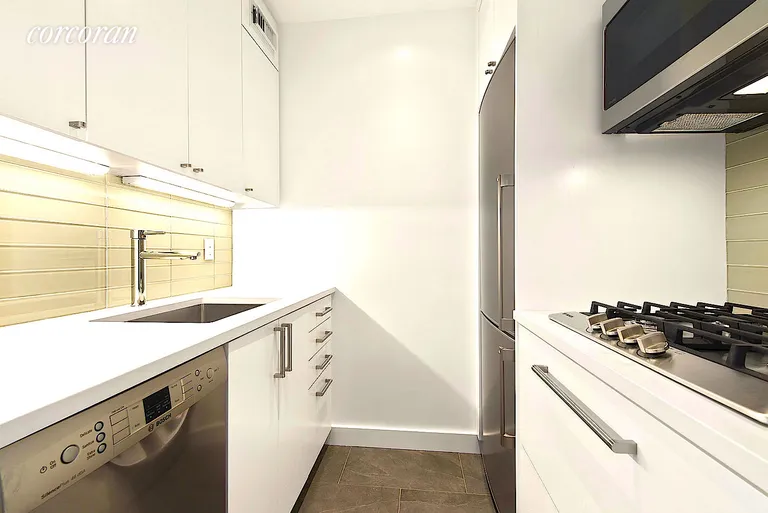 New York City Real Estate | View 67 East 11th Street, 723 | Mint Kitchen w Stainless Appliances | View 3