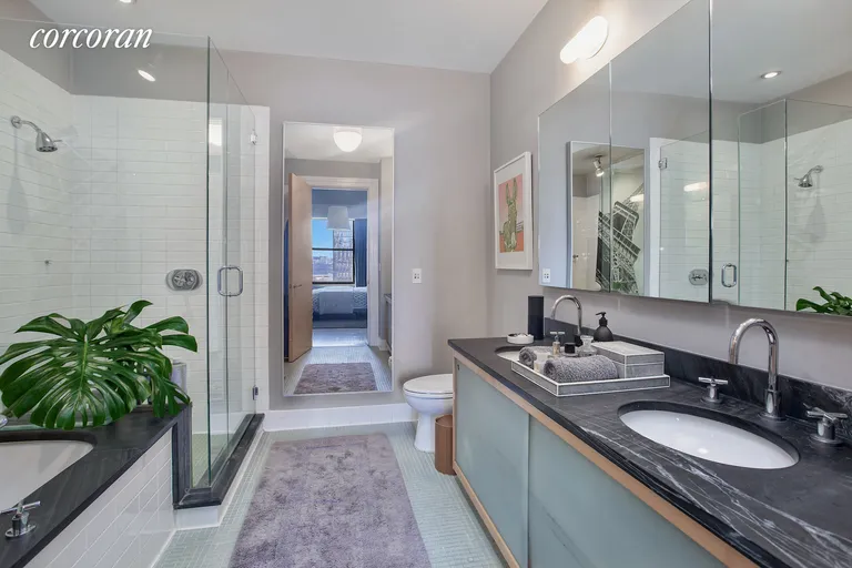 New York City Real Estate | View 70 Washington Street, 12A | Master bathroom with double sink, shower & tub | View 6