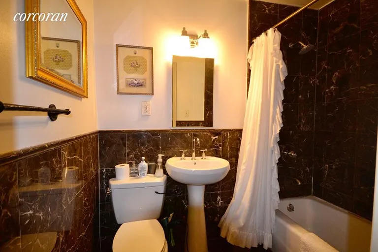 New York City Real Estate | View 38 West 69th Street, 1B | Clean and elegant bathroom | View 7