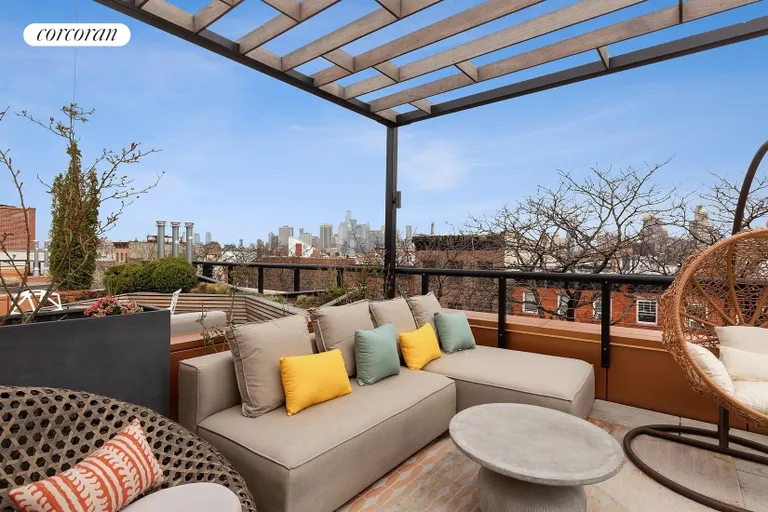 New York City Real Estate | View 296 Sackett Street | Ipe and Corten Steel Seating | View 15