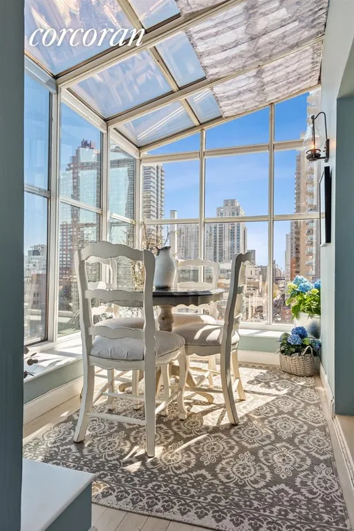 New York City Real Estate | View 444 East 75th Street, 20C | Dining Solarium | View 6