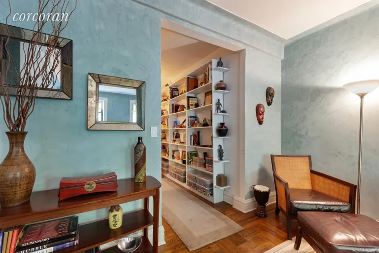 New York City Real Estate | View 230 East 71st Street, 2H | Elegant entry hall with built-in bookcases | View 2