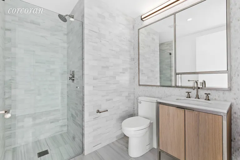 New York City Real Estate | View 207 West 79th Street, 5B | stunning materials in large 2nd Bathroom | View 10