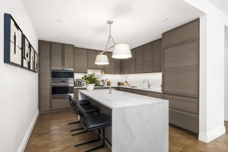 New York City Real Estate | View 207 West 79th Street, 5A | 14 ft eat in kitchen with over sized marble island | View 4