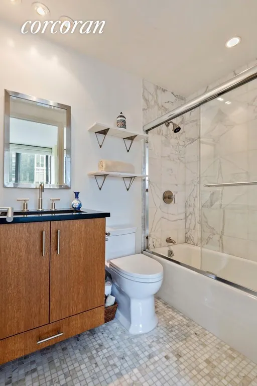 New York City Real Estate | View 300 East 85th Street, 1406 | Renovated Bathroom | View 4
