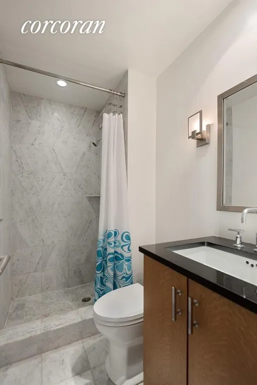 New York City Real Estate | View 300 East 85th Street, 1406 | Renovated Bathroom | View 6