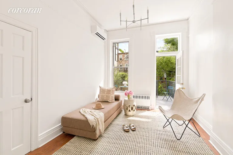 New York City Real Estate | View 390 Bergen Street, 1 | Bedroom leading to deck and garden | View 5