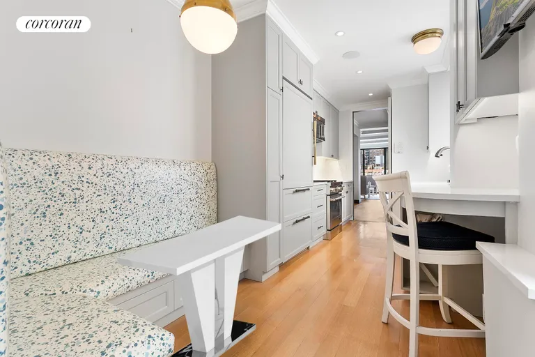 New York City Real Estate | View 122 East 82Nd Street, 9A | Eat-in Kitchen with Banquette | View 8