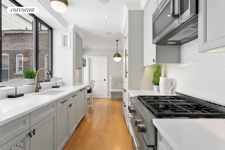 New York City Real Estate | View 122 East 82Nd Street, 9A | Chef's Kitchen with Sub-zero & new appliances | View 7