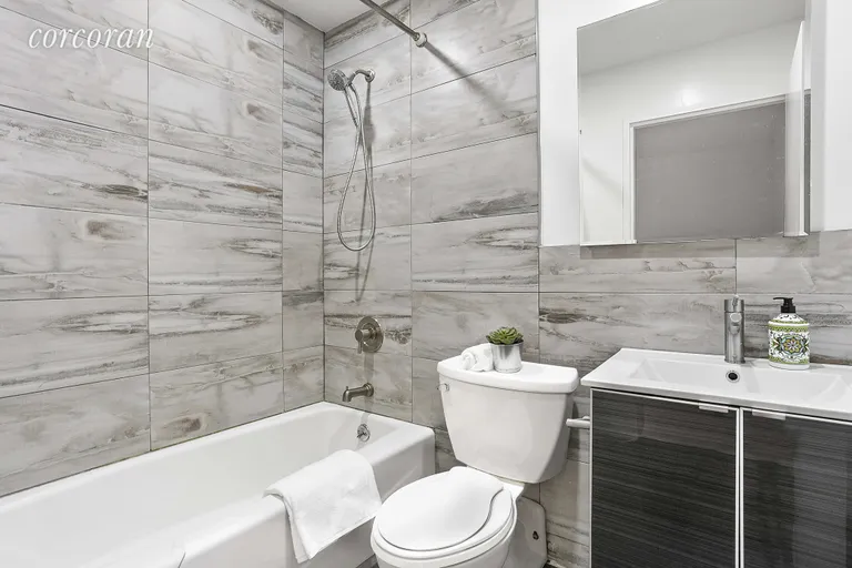 New York City Real Estate | View 96 Schermerhorn Street, PHK | Fully renovated bathroom with tub | View 4