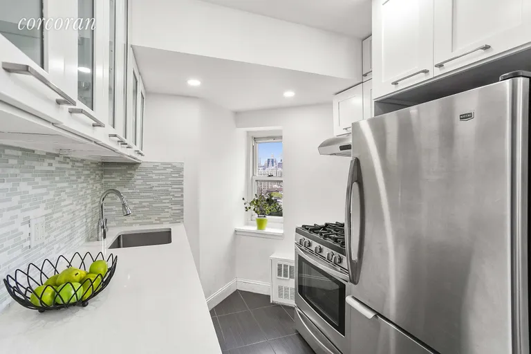 New York City Real Estate | View 96 Schermerhorn Street, PHK | Renovated kitchen with white quartz stone counters | View 2